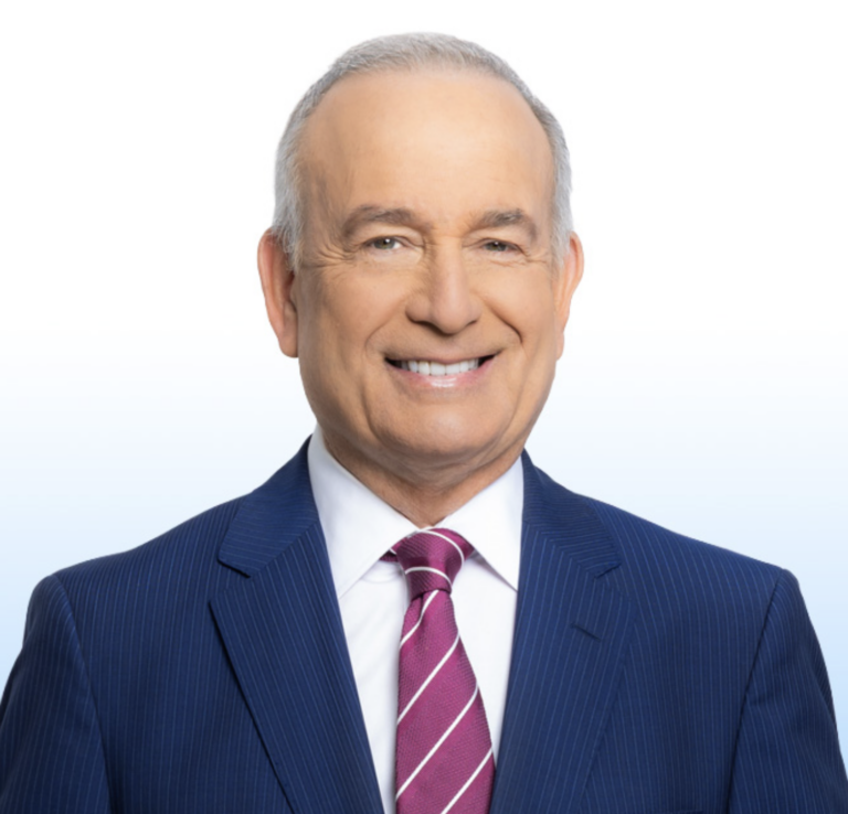 This is an image of Eliott Rodriguez, candidate for Florida's 27th Congressional District. He is pictured in a blue suit with a white shirt and red tie in front of a blue-white gradient background.
